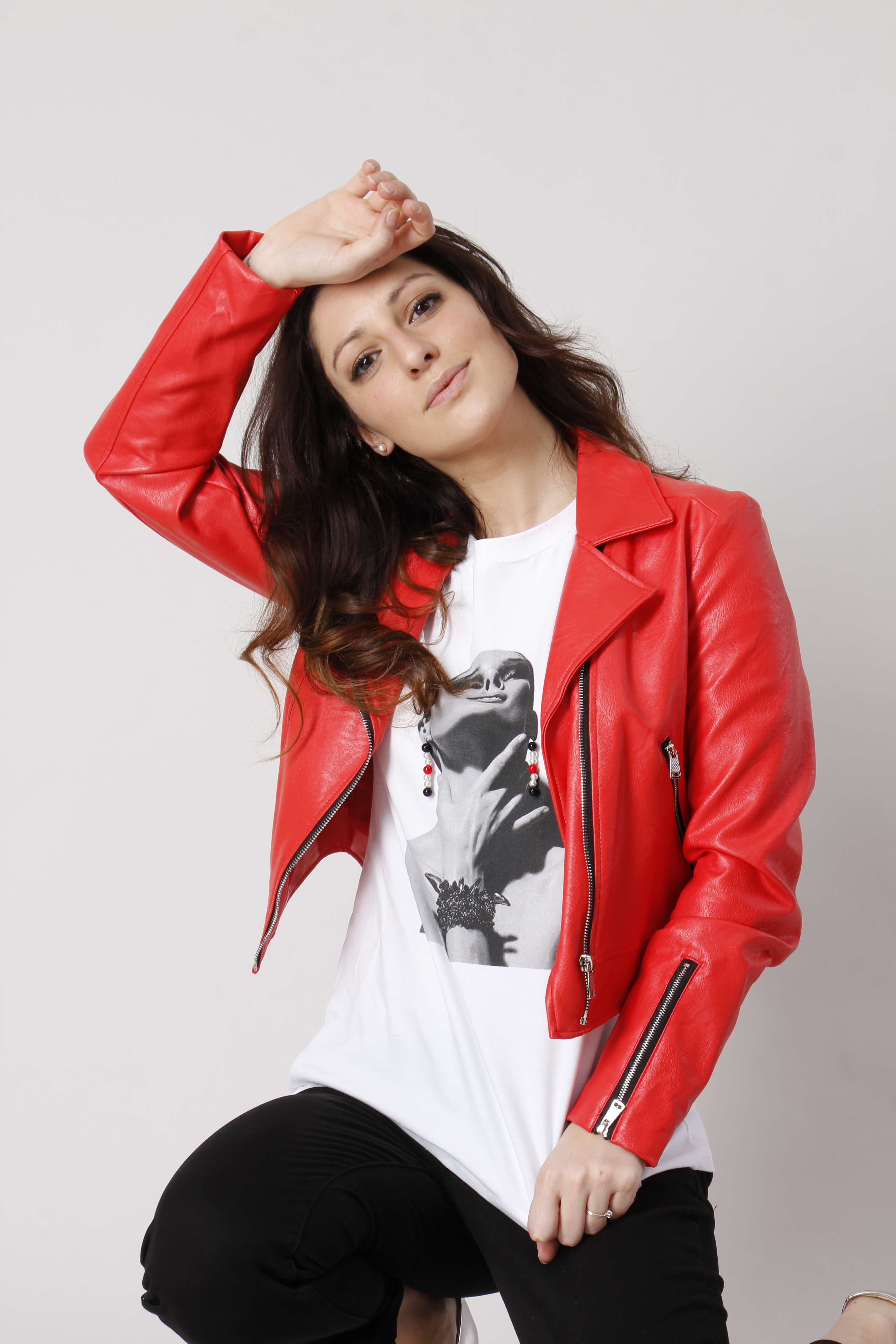 Italian wholesale fashion — red leather biker jacket with graphic tee